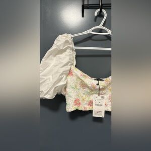 Balloon sleeve crop top with ruched floral detail